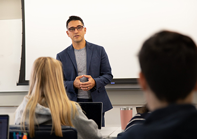 Professor teaching to students