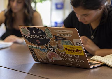 Student's laptop covered in stickers