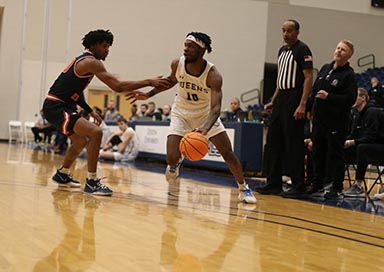 Queens basketball team during game