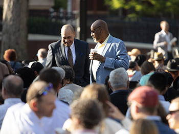 Family members talking at commencement seats