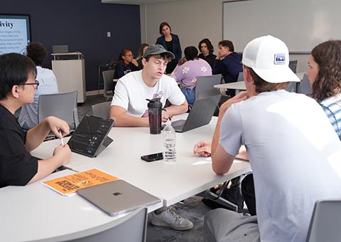 Students discussing in class