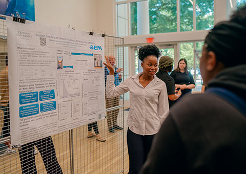 Student presenting at Day of Scholarship and Service
