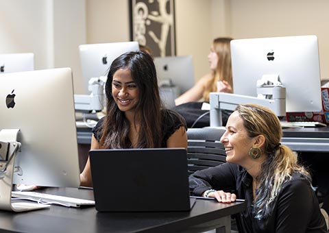 Professor and student working on interior design project