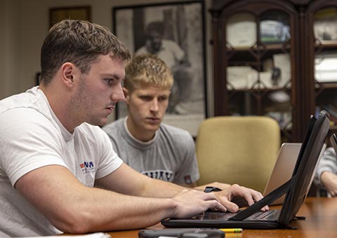 Two students working on project