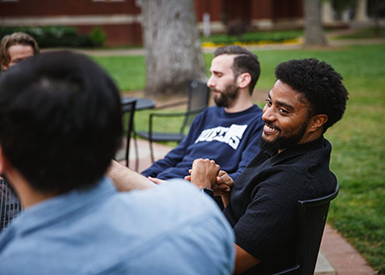 Alumni sitting and talking