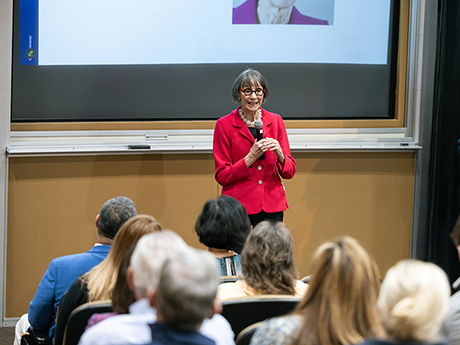 Alumni speaking at awards ceremony