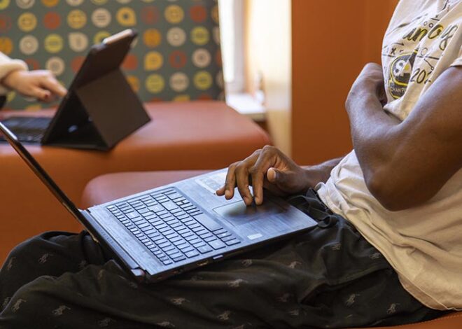 Students working on laptop