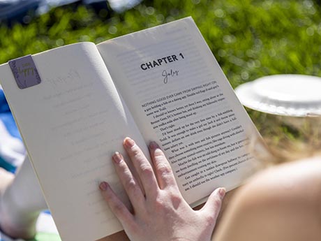 Student reading a book