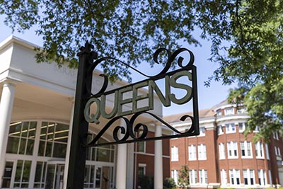 Queens sign in front of Gambrell