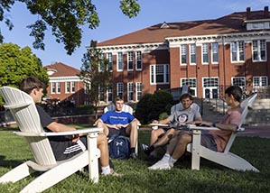 Students sitting in resident quad