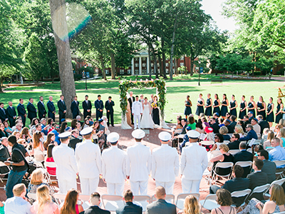 Outdoor wedding behind Queens Hall
