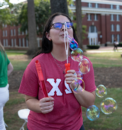 Chi Omega blowing bubbles
