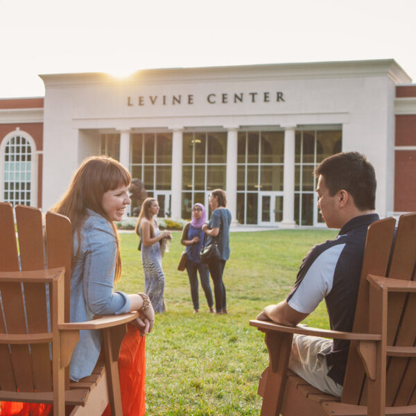 Students sitting outside of Levine Center