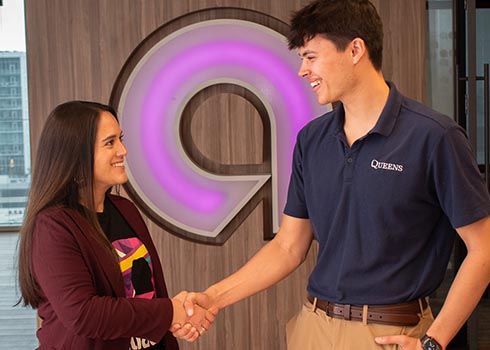 Student and Ally employee shaking hands