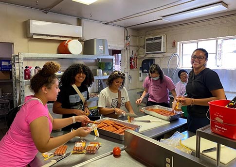 Students prepping food at US border