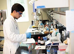 Student working in science lab