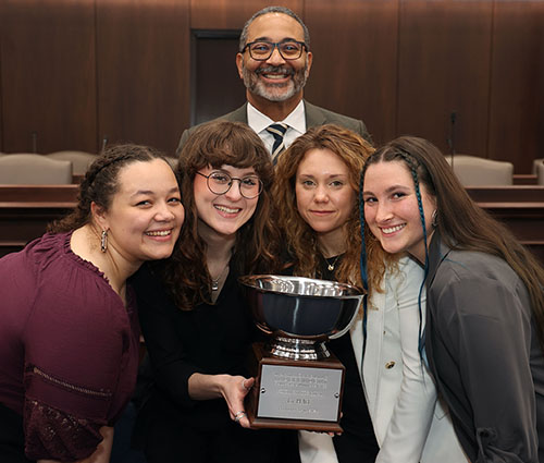 President Lugo with Ethics Bowl team and trophy
