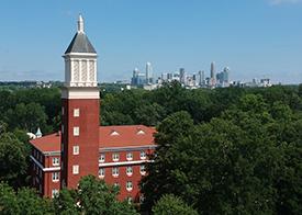 Queens bell tower and Charlotte skyline