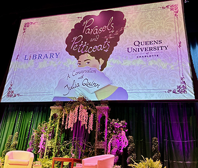 Stage set up for Julia Quinn event at Queens