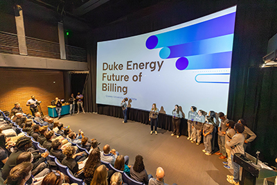 Queens students presenting