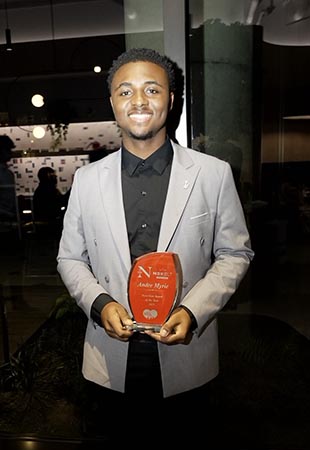 Andre Myrie hold Next-Gen award