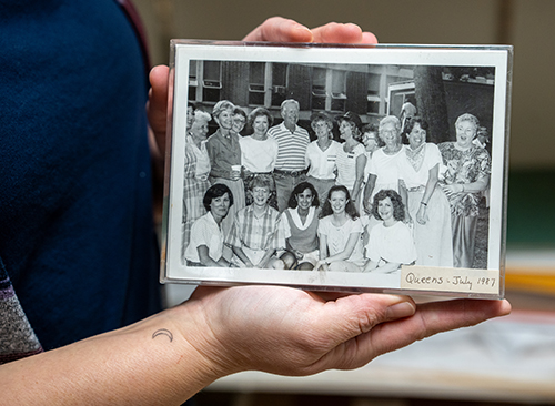 Sarah Sowa holding old class photo