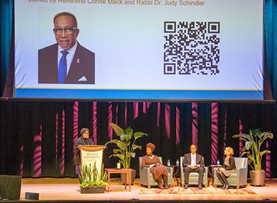 Holocaust Remembrance event speakers on stage