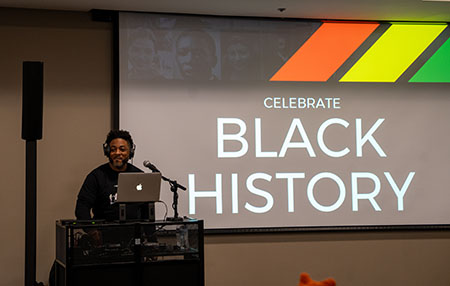 DJ playing music at Black Popup Shop