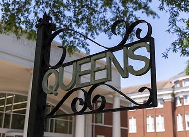 Old metal Queens sign