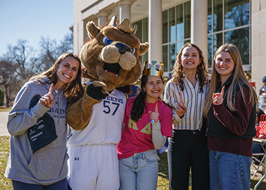 Students posing with Rex