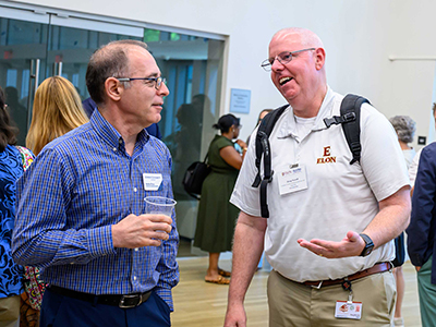 IT professionals talking at College Coffee