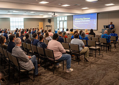 Jesse Cureton speaking to faculty and staff